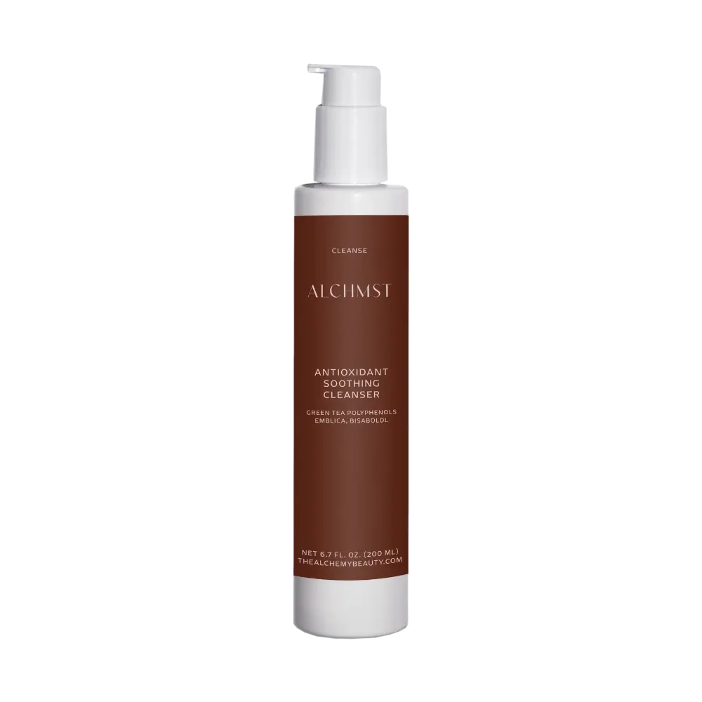 A sleek bottle of Alchimst Antioxidant Soothing Cleanser with pump top against black background, featuring green tea polyphenols, emblica, bisabolol ingredients.