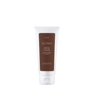 Tube of Alchemist Gentle Enzyme Cleanser, featuring papain enzymes and green tea extract. White packaging with brown label, 200 ml.
