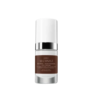 Bottle of Alchemist Retinol + Niacinamide Eye Cream, featuring a sleek design with a silver cap and brown label against a plain black background.