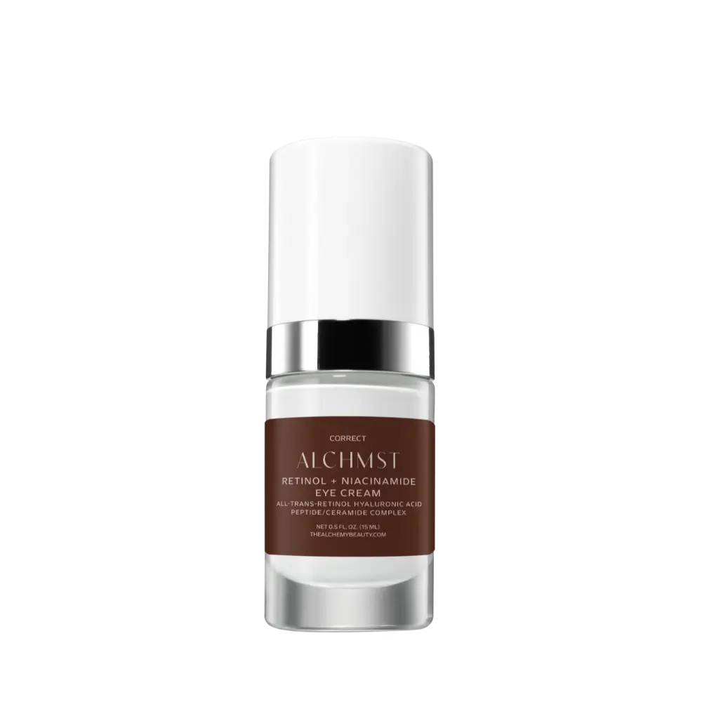 Bottle of Alchemist Retinol + Niacinamide Eye Cream, featuring a sleek design with a silver cap and brown label against a plain black background.