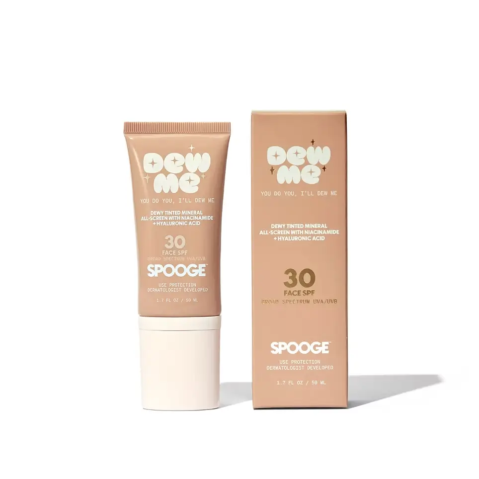 A face sunscreen tube and box labeled "Dew Me." SPF 30, tinted mineral formula with niacinamide and hyaluronic acid, dermatologist developed.