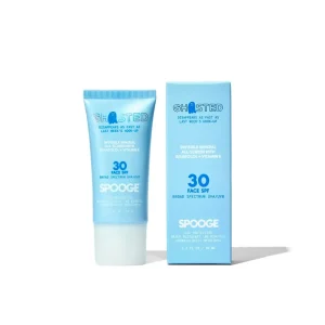 Blue packaging of "Ghosted" SPF 30 face sunscreen with box, featuring mineral all-screen formulation, bisabolol, and vitamin E. Designed for broad spectrum protection.